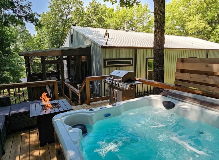 Hot Tub in the Woods Vacation Rental Deck with Hot Tub at Hogscald Hollow Cabins