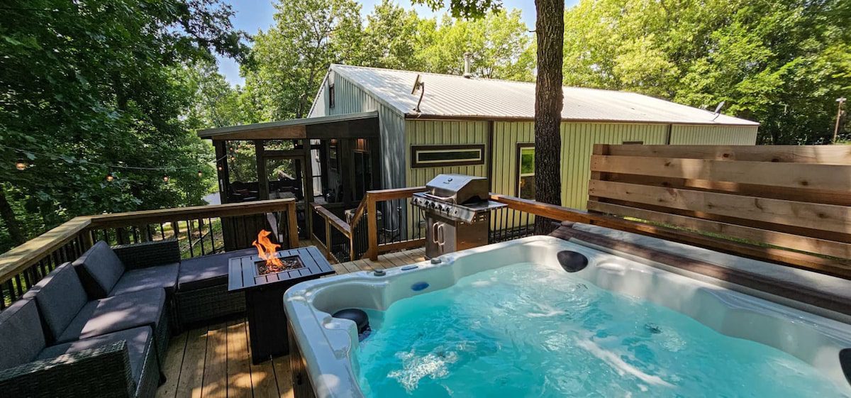 Hot Tub in the Woods Vacation Rental Deck with Hot Tub at Hogscald Hollow Cabins