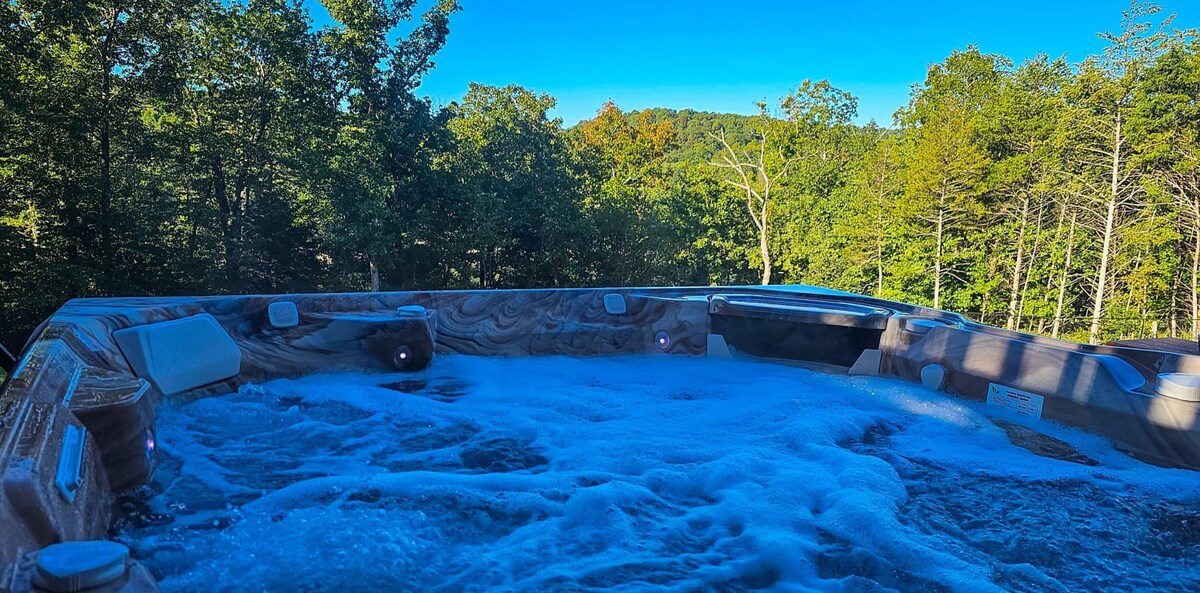 Hot Tub View at Loft at Lovers Leap - Hogscald Hollow Cabins Vacation Rentals